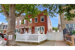 Legal 2 family semi attached brick home in Marine Park features two spacious units, original hardwood and tile floors, an unfinished basement with separate entrance, a generous sized yard, a ...
