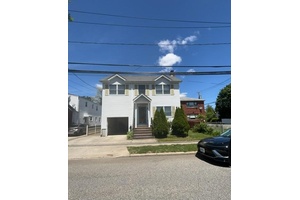 Large and spacious home built in 2006 features 4 bedrooms, 3 full baths, hardwood floors throughout, living room with fireplace, large spacious kitchen with formal dining room, sliders to back ...