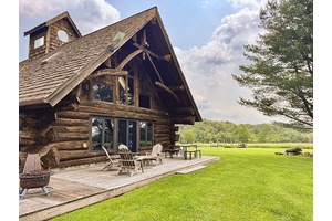 Meadow Lodge is a unique private retreat on a scenic rise with stunning Western Catskills and meadow views.