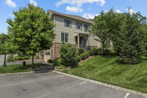 Spacious end unit townhome with 2 bedrooms plus office in Valeria with beautiful finishes and wood floors throughout.