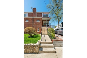 Absolutely stunning, meticulously maintained semi detached two family home with a spacious yard and 6 parking spots !