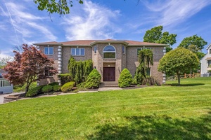 Welcome to 8 Marcus Drive a beautifully maintained brick front residence set on an over sized, expansive, park like property in the heart of desirable Wesley Hills.