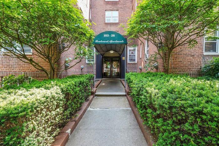 Property entrance  and brick siding