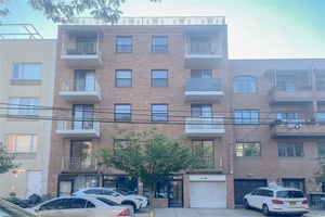 Welcome to this spacious condo located at 71 24 163rd Street, Unit 5A.