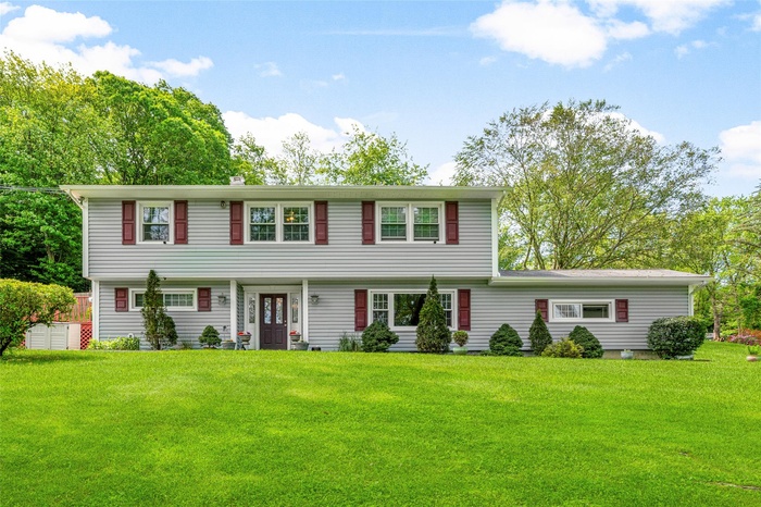 Home featuring a front yard