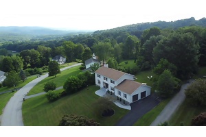 A O, contracts started. This stunning Center Hall Colonial offers luxurious living on a picturesque knoll with breathtaking mountain views and a park like backyard, perfect for family gatherings and ...
