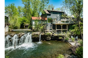 Positioned just moments from the vibrant energy of Tinker Street and the heart of Woodstock, this 2, 496 sqft mixed use property offers an exceptional opportunity to live, work, and ...