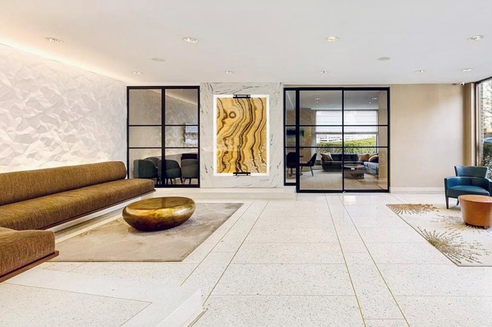 Common area featuring floor to ceiling windows and recessed lighting