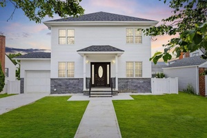 Welcome to this charming home located in the heart of New Hyde Park, offering the perfect blend of modern updates and classic appeal.