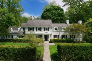 Tucked behind manicured hedges on a prized.