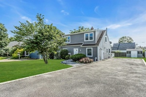 BEST PRICED EXPANDED CAPE IN THE HEART OF LEVITTOWN MACARTHUR SECTION !
