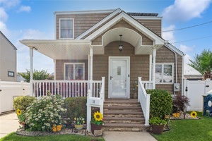 Welcome to this beautifully updated 4 bedroom, 2 bath Cape nestled in one of Franklin Square's most sought after neighborhoods and within the highly regarded School District 17.