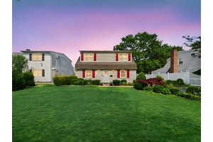 Charming Cape style home featuring 4 bedrooms and 1 updated bathroom, situated on an oversized lot in a prime Levittown location.