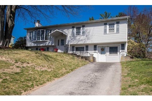 Welcome to this spacious 4 bedroom, 2 bath raised ranch in the sought after Rockingham Farms community of Wappingers.