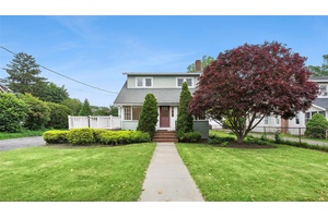 Welcome to 1018 Roanoke Ave, a unique mixed use property located in the heart of Riverhead, close to Peconic Bay Medical Center and the Route 58 traffic circle.