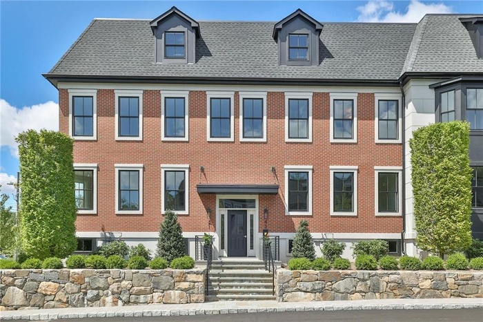 View of front facade with brick siding