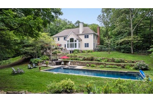 Welcome home to this beautiful colonial, perfectly situated in a spectacular private setting that backs up to the pristine Mianus River Gorge.