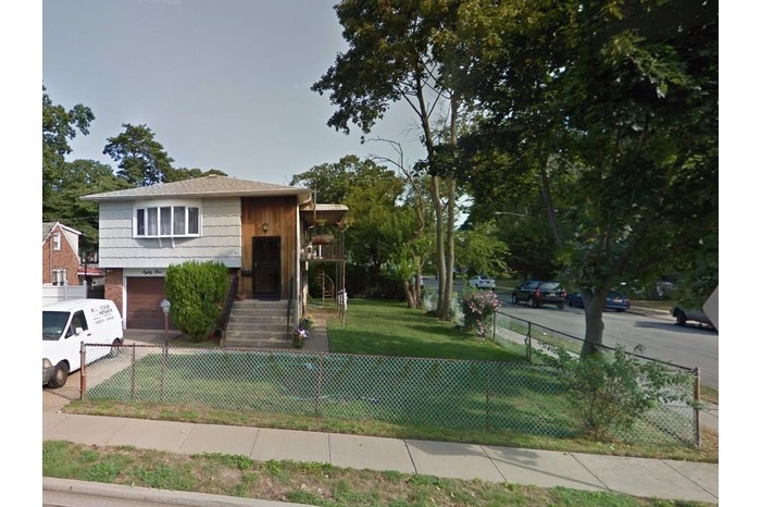 View of front of home with a garage