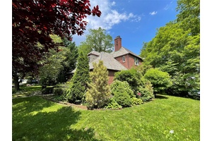 Corner Tudor Style 2 Story One Family Home Key Features Corner lot with 4 entrances 3 on Kildare Rd, 1 on Utopia Blvd.