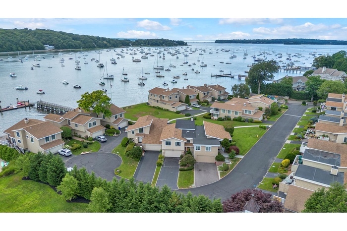 Aerial view of residential area with a large body of water