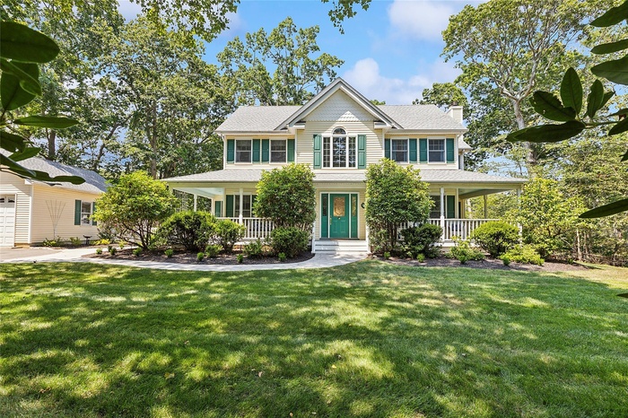 A new walkway, 2 front porches, and a detached garage.
