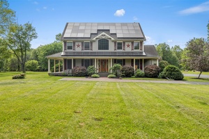 Welcome to 1252 Albany Post Road in Gardiner, New York an exceptional custom Colonial home set on 4.