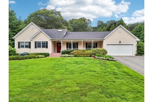 Welcome to 17 Wood Hollow Lane a beautifully updated 5 bedroom, 2.