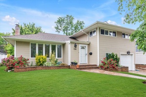 This Beautifully Renovated Split Level Home Offers Modern Comfort and Style.