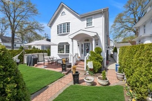 This is a 4 bedroom, 3. 5 bathroom colonial house with a finished basement.