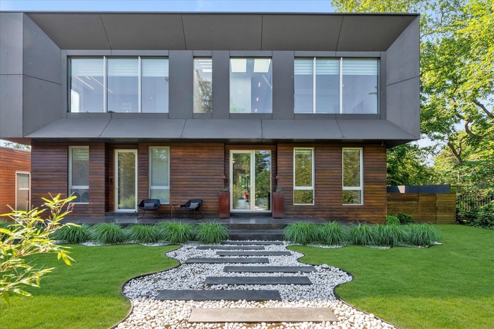 View of front of property with a front yard