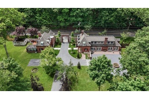 Once a stately Carriage House, this beautifully reimagined main residence seamlessly blends historic character with modern comfort.