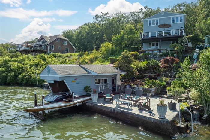 Boathouse has an electric lift, store your boat here year-round!