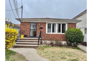 motivated seller. Mint condition one family ranch house in the heart of Jamaica Queens with driveway, full basement with separate entrance.
