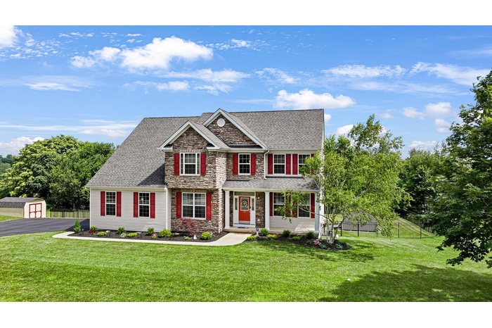 Professionally designed grounds in executive neighborhood.