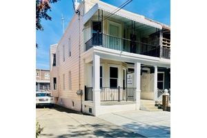 This beautifully fully renovated semi detached two family home offers the perfect blend of modern living and comfort.