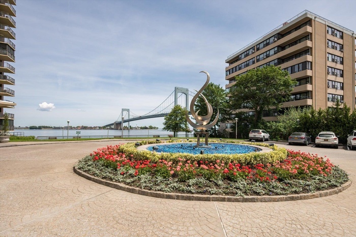 Surrounding community with a water view