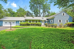 Many improvements made. Nestled on just over a level half an acre, this 1953 ranch style gem blends classic mid century modern design with everyday comfort.