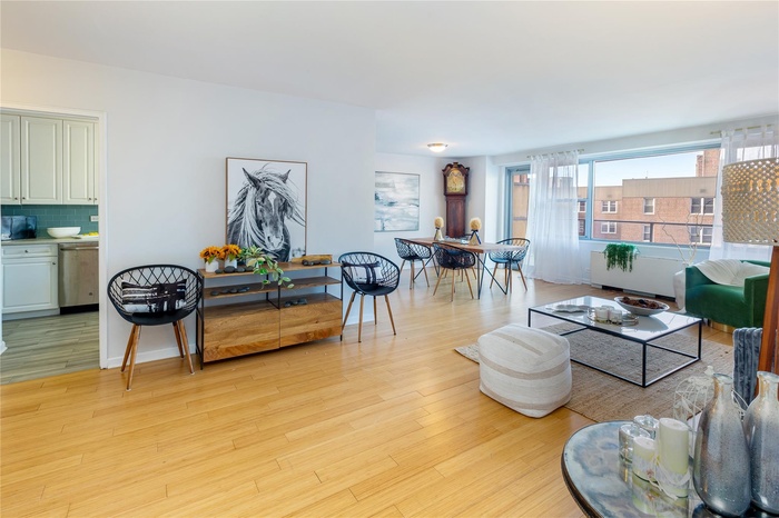 Living room featuring light wood-style flooring