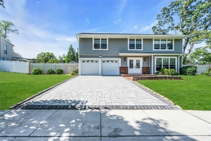 Large 5 Bedroom Brookfield Colonial with 2 Car Garage, Desirable Hauppauge Schools, Side Walks, New Eat In Kitchen with Quartz Counters, New Appliances, Finished Basement with OSE, Large Shed, Wood ...