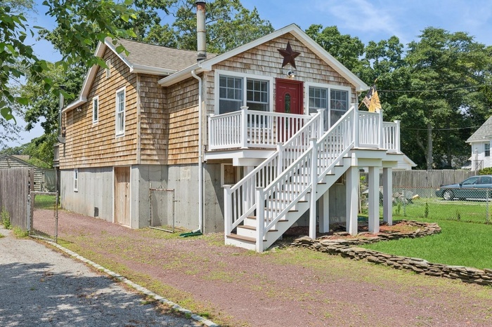 View of front left of property featuring showcasing the FEMA raised foundation