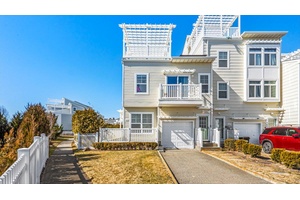 This turnkey, fully integrated smart home offers a unique blend of modern technology, comfort, and spacious living across a 2 family layout.