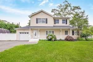 This beautifully renovated Colonial offers space, style, and suburban tranquility.