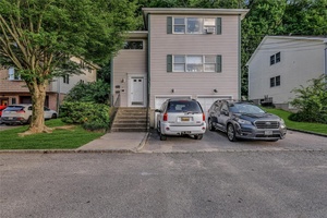 Welcome To 14 Long Branch Road, A Rarely Available Well Maintained Newer Constructed Two Family Home In The Heart Of Glen Cove.