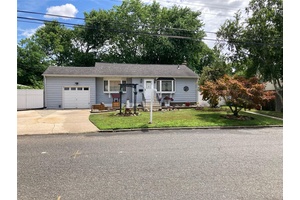 A beautiful expanded large ranch with great curb appeal.