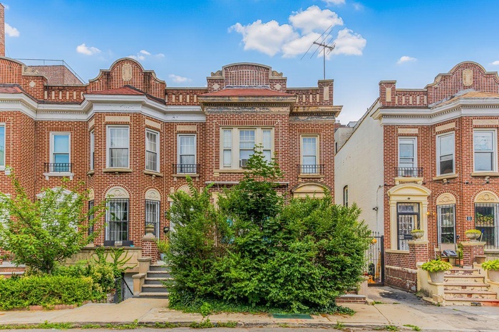View of front facade with brick siding