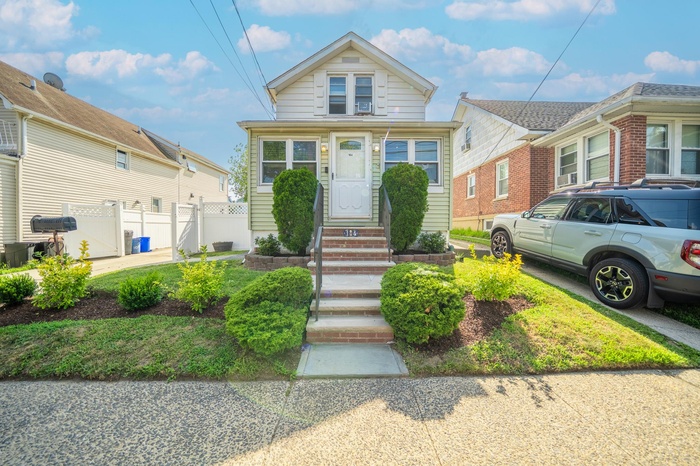 View of front of house with entry steps