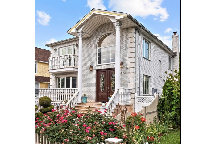 View of front of property featuring brick siding