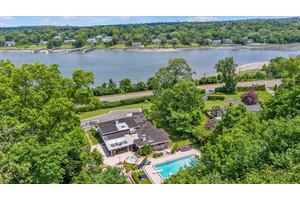 KINGS POINT CONTEMPORARY RANCH WITH UNOBSTRUCTED WATER VIEWS Discover the Perfect Blend of Modern Elegance and Resort Style Living Set On A Beautifully 1 Acre Landscaped Property with a Circular ...