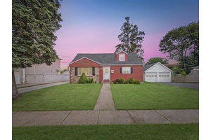 Welcome to this well maintained Cape style home located in the heart of Hicksville.