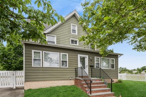 Beautifully maintained 5 generous bedroom, 2 full bath Center Hall Colonial located in charming incorporated village of Malverne.